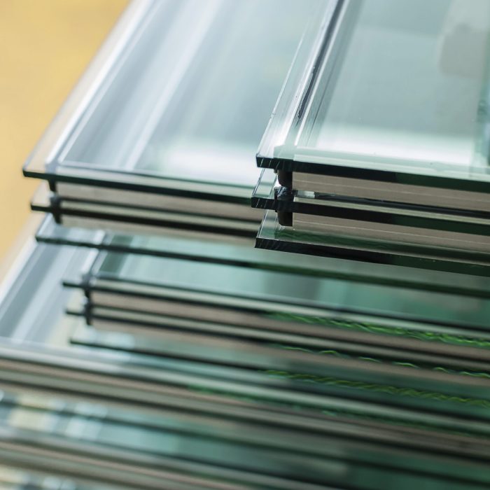 Sheets of Factory manufacturing tempered clear float glass panels cut to size